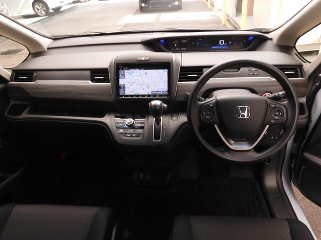 フリード Ｇブラックスタイル　ワンオーナー　９インチナビ　バックカメラ　アダプティブクルーズコントロール　両側電動スライドドア　シートヒーター　Ｂｌｕｅｔｏｏｔｈ　フルセグＴＶ　ＬＥＤヘッドライト　衝突被害軽減ブレーキ　禁煙車（7枚目）