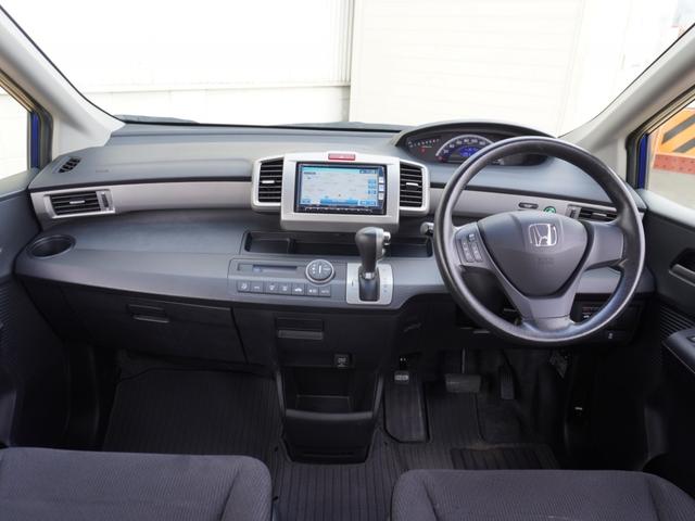 フリード ＧＨ　ワンオーナー　７インチナビ　フルセグＴＶ　バックカメラ　ＥＴＣ　片側電動両側スライドドア　Ｂｌｕｅｔｏｏｔｈ　電動格納ドアミラー　横滑り防止装置　禁煙車（7枚目）