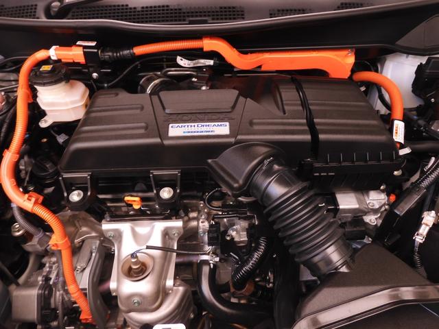 オデッセイハイブリッド ハイブリッドアブソルート・ＥＸホンダセンシング　９インチメモリーナビ　全周囲カメラ　ＥＴＣ２．０　渋滞追従クルーズ　両側電動スライドドア　シートヒーター　Ｂｌｕｅｔｏｏｔｈ　ブラインドスポット　障害物センサー　オットマン　禁煙車　スペアキー有り（24枚目）