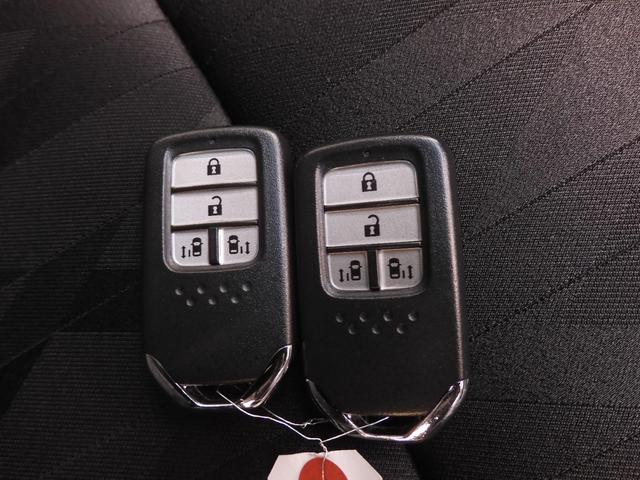 オデッセイハイブリッド ハイブリッドアブソルート・ＥＸホンダセンシング　９インチメモリーナビ　全周囲カメラ　ＥＴＣ２．０　渋滞追従クルーズ　両側電動スライドドア　シートヒーター　Ｂｌｕｅｔｏｏｔｈ　ブラインドスポット　障害物センサー　オットマン　禁煙車　スペアキー有り（25枚目）