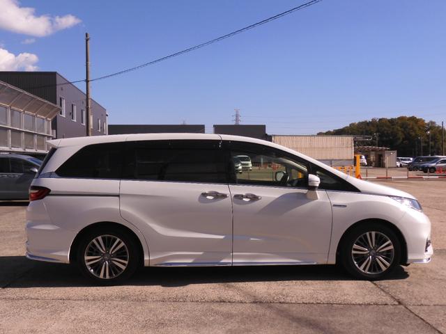 オデッセイハイブリッド ハイブリッドアブソルート・ＥＸホンダセンシング　９インチメモリーナビ　全周囲カメラ　ＥＴＣ２．０　渋滞追従クルーズ　両側電動スライドドア　シートヒーター　Ｂｌｕｅｔｏｏｔｈ　ブラインドスポット　障害物センサー　オットマン　禁煙車　スペアキー有り（29枚目）
