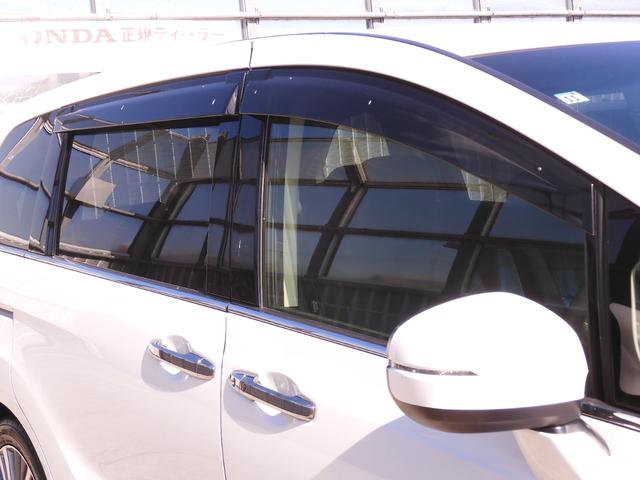 オデッセイハイブリッド ハイブリッドアブソルート・ＥＸホンダセンシング　９インチメモリーナビ　全周囲カメラ　ＥＴＣ２．０　渋滞追従クルーズ　両側電動スライドドア　シートヒーター　Ｂｌｕｅｔｏｏｔｈ　ブラインドスポット　障害物センサー　オットマン　禁煙車　スペアキー有り（31枚目）