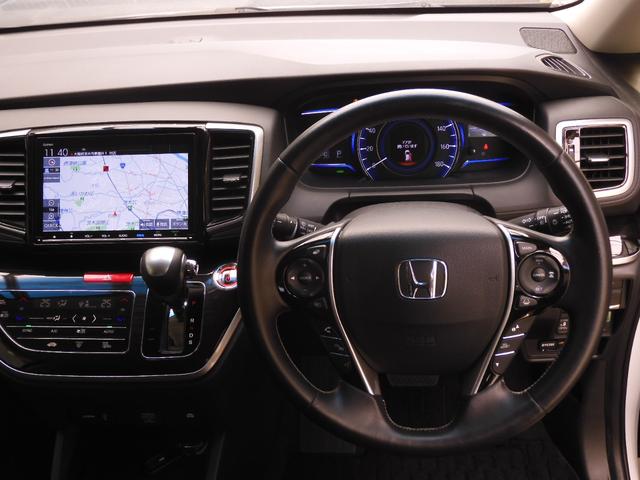 オデッセイハイブリッド ハイブリッドアブソルート・ＥＸホンダセンシング　９インチメモリーナビ　全周囲カメラ　ＥＴＣ２．０　渋滞追従クルーズ　両側電動スライドドア　シートヒーター　Ｂｌｕｅｔｏｏｔｈ　ブラインドスポット　障害物センサー　オットマン　禁煙車　スペアキー有り（42枚目）