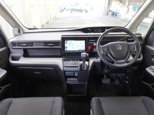 ステップワゴンスパーダ スパーダホンダセンシング　ワンオーナー　９インチナビ　バックカメラ　ＥＴＣ　アダプティブクルーズコントロール　両側電動スライドドア　Ｂｌｕｅｔｏｏｔｈ　ＬＥＤヘッドライト　衝突被害軽減ブレーキ　純正アルミホイール　パドルシフト（7枚目）
