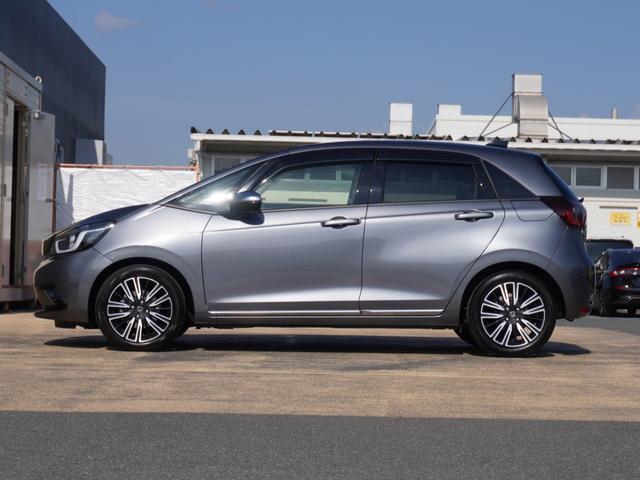 フィット リュクス　ワンオーナー車　９インチナビ（純正用品ＶＸＵ－２１５ＦＴｉ）　バックカメラ　ＥＴＣ　シートヒーター　Ｂｌｕｅｔｏｏｔｈ　ＵＳＢ入力端子　ＬＥＤオートライト　衝突被害軽減ブレーキ　障害物センサー（14枚目）