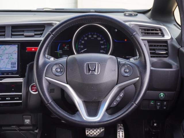 フィットハイブリッド Ｓパッケージ　８インチナビ　バックカメラ　ＥＴＣ１．０　クルーズコントロール　Ｂｌｕｅｔｏｏｔｈ　ＬＥＤヘッドライト　衝突被害軽減ブレーキ　純正アルミホイール　パドルシフト　スマートキー（55枚目）