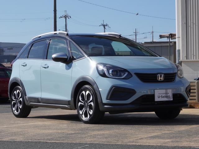 フィット ｅ：ＨＥＶクロスター　９インチナビ　バックカメラ　ドラレコ　ＥＴＣ　アダプティブクルーズコントロール　Ｂｌｕｅｔｏｏｔｈ　ＵＳＢ入力端子　ＬＥＤヘッドライト　衝突被害軽減ブレーキ　障害物センサー　純正アルミホイール　禁煙車（25枚目）