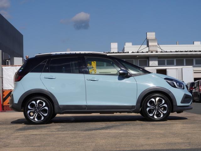 フィット ｅ：ＨＥＶクロスター　９インチナビ　バックカメラ　ドラレコ　ＥＴＣ　アダプティブクルーズコントロール　Ｂｌｕｅｔｏｏｔｈ　ＵＳＢ入力端子　ＬＥＤヘッドライト　衝突被害軽減ブレーキ　障害物センサー　純正アルミホイール　禁煙車（27枚目）