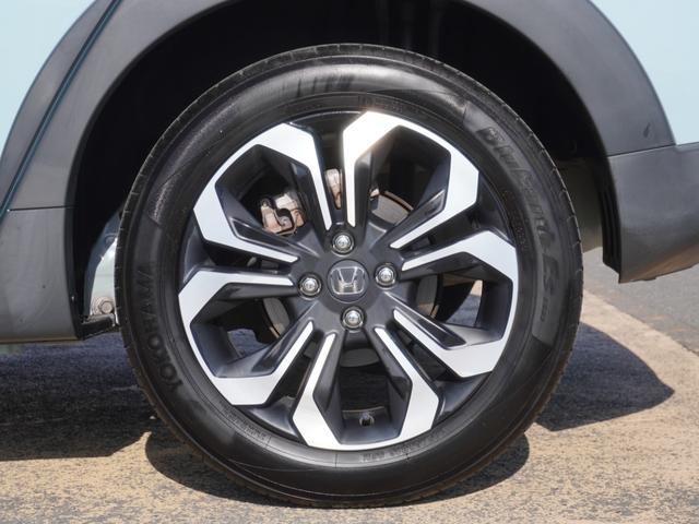 フィット ｅ：ＨＥＶクロスター　９インチナビ　バックカメラ　ドラレコ　ＥＴＣ　アダプティブクルーズコントロール　Ｂｌｕｅｔｏｏｔｈ　ＵＳＢ入力端子　ＬＥＤヘッドライト　衝突被害軽減ブレーキ　障害物センサー　純正アルミホイール　禁煙車（32枚目）