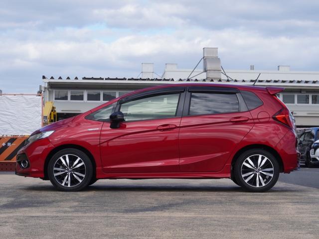 フィットハイブリッド Ｓホンダセンシング　ワンオーナー　７インチ純正フルセグナビＲカメラ　ＥＴＣ　クルコン　パドル付本革ハンドル　プラクラ付エアコン　Ｂｌｕｅｔｏｏｔｈ　ＵＳＢ　ＬＥＤヘッド・フォグ　衝突軽減ブレーキ　純正１６アルミ　禁煙車（15枚目）