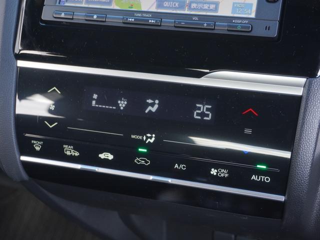 フィットハイブリッド Ｓホンダセンシング　ワンオーナー　７インチ純正フルセグナビＲカメラ　ＥＴＣ　クルコン　パドル付本革ハンドル　プラクラ付エアコン　Ｂｌｕｅｔｏｏｔｈ　ＵＳＢ　ＬＥＤヘッド・フォグ　衝突軽減ブレーキ　純正１６アルミ　禁煙車（19枚目）