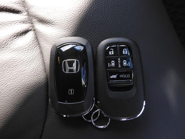 オデッセイハイブリッド e:HEVアブソルート・EX デモカー 11.4インチナビ+全周囲カメラ ナビ連動ドラレコ+ETC レザーシート 1・2列目シートヒーター付電動シート 3ゾーンコントロールエアコン ハンズフリー電動テールゲート 18インチアルミ(37枚目)