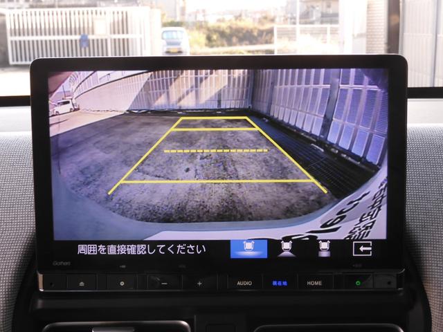 フリード e:HEVエアーEX デモカー 11インチナビ バックカメラ ドラレコ ETC アダプティブクルーズコントロール 両側電動スライドドア シートヒーター Bluetooth LEDヘッドライト 衝突被害軽減ブレーキ 禁煙車(4枚目)