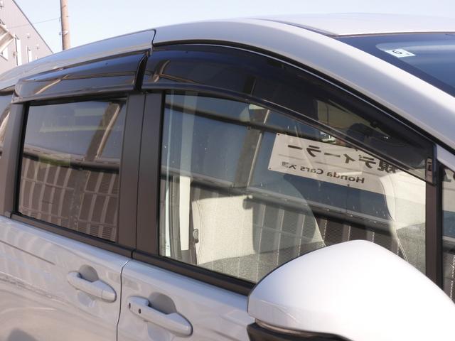 フリード e:HEVエアーEX デモカー 11インチナビ バックカメラ ドラレコ ETC アダプティブクルーズコントロール 両側電動スライドドア シートヒーター Bluetooth LEDヘッドライト 衝突被害軽減ブレーキ 禁煙車(31枚目)