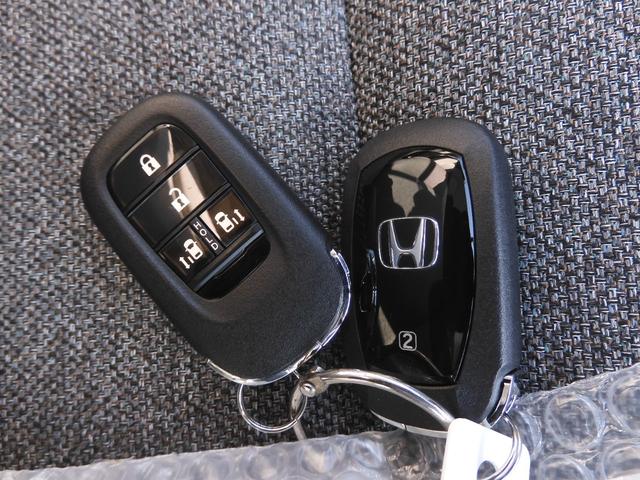 フリード e:HEVエアーEX デモカー 11インチナビ バックカメラ ドラレコ ETC アダプティブクルーズコントロール 両側電動スライドドア シートヒーター Bluetooth LEDヘッドライト 衝突被害軽減ブレーキ 禁煙車(40枚目)