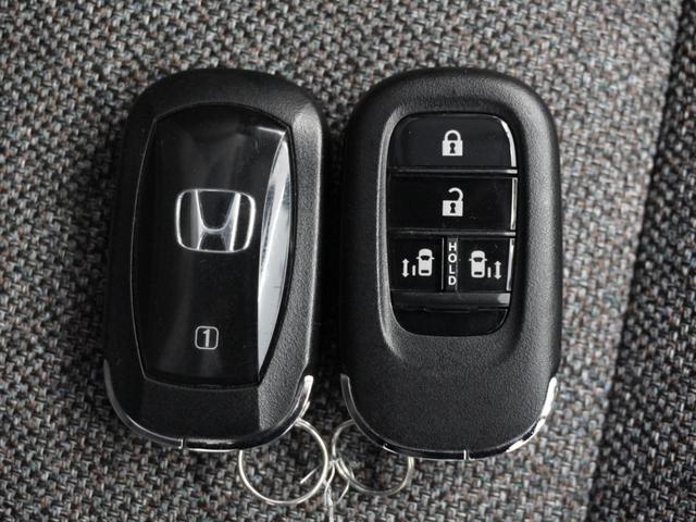 フリード エアーEX 2年保証ナビDレコRカメETC両電扉BT地デジ 渋滞追従クルーズ Bluetooth 障害物センサー シートヒーター ブラインドスポット デイライト オートハイビーム 15インチ純正アルミホイール(20枚目)