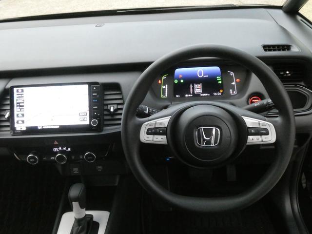 フィット ｅ：ＨＥＶクロスター　ワンオーナー　９インチナビ　バックカメラ　ＥＴＣ　アダプティブクルーズコントロール　Ｂｌｕｅｔｏｏｔｈ　ＵＳＢ入力端子　ＬＥＤヘッドライト　衝突被害軽減ブレーキ　純正アルミホイール　禁煙車（53枚目）