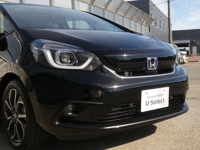 フィット ｅ：ＨＥＶネス　ワンオーナー　９インチナビ　バックカメラ　ドラレコ　ＥＴＣ　アダプティブクルーズコントロール　Ｂｌｕｅｔｏｏｔｈ　ＵＳＢ入力端子　ＬＥＤヘッドライト　衝突被害軽減ブレーキ　純正アルミホイール　禁煙車（34枚目）