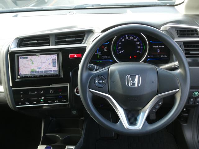 フィットハイブリッド Ｆパッケージコンフォートエディション　７インチナビ　バックカメラ　ＥＴＣ　Ｂｌｕｅｔｏｏｔｈ　ＵＳＢ入力端子　ＬＥＤヘッドライト　衝突被害軽減ブレーキ　　スペアキー有　オートエアコン　アイドリングストップ　電動格納ドアミラー　禁煙車（13枚目）