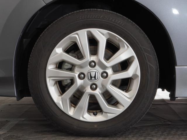 フィット 13G・Sホンダセンシング 1年保証ナビDレコRカメETCパドルシフト アダプティブクルーズコントロール Bluetooth プラズマクラスター搭載エアコン 15インチ純正アルミホイール サイド/サイドカーテンエアバッグ(17枚目)