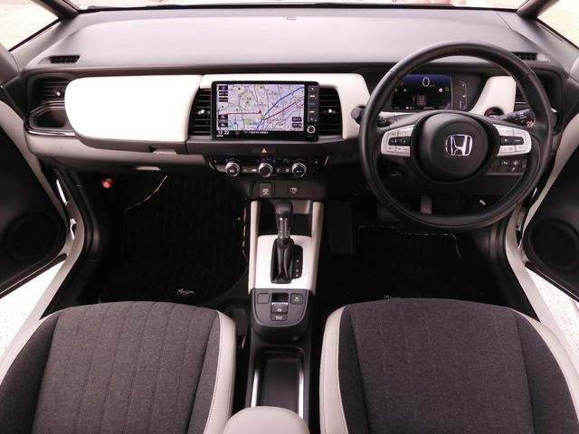 フィット ｅ：ＨＥＶホーム２０周年特別仕様車メゾン　ワンオーナー　９インチナビ　バックカメラ　ドラレコ　ＥＴＣ　アダプティブクルーズコントロール　シートヒーター　Ｂｌｕｅｔｏｏｔｈ　ＵＳＢ入力端子　ＬＥＤヘッドライト　衝突被害軽減ブレーキ　禁煙車（8枚目）