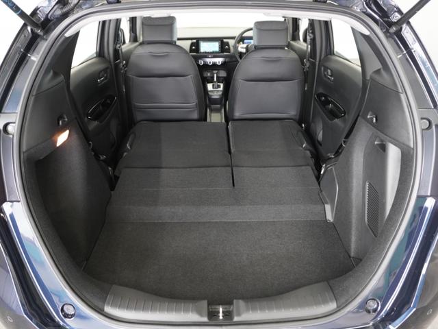 フィット ｅ：ＨＥＶホーム　１年保証ナビＤレコＲカメＥＴＣクルコンＢＴ地デジ　渋滞追従クルーズ　Ｂｌｕｅｔｏｏｔｈ　障害物センサー　デイライト　オートハイビーム　ＵＳＢ接続　衝突軽減ブレーキ　オートブレーキホールド　オートライト（28枚目）