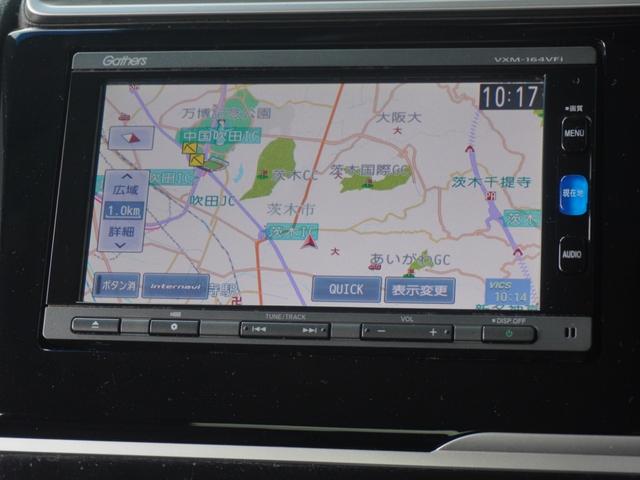 フィットハイブリッド Ｆパッケージコンフォートエディション　７インチナビ　バックカメラ　ＥＴＣ　Ｂｌｕｅｔｏｏｔｈ　ＬＥＤヘッドライト　シートヒーター　衝突被害軽減ブレーキ　横滑り防止装置　フルセグ　電動格納ドアミラー　盗難防止装置　アイドリングストップ（3枚目）