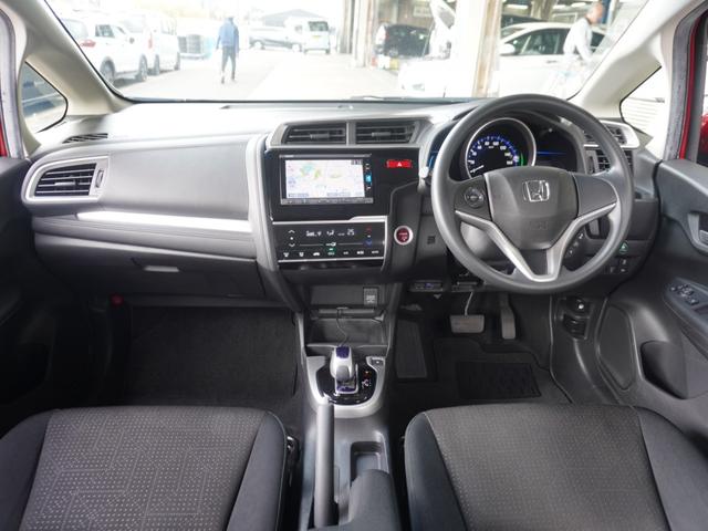 フィットハイブリッド Ｆパッケージコンフォートエディション　７インチナビ　バックカメラ　ＥＴＣ　Ｂｌｕｅｔｏｏｔｈ　ＬＥＤヘッドライト　シートヒーター　衝突被害軽減ブレーキ　横滑り防止装置　フルセグ　電動格納ドアミラー　盗難防止装置　アイドリングストップ（7枚目）