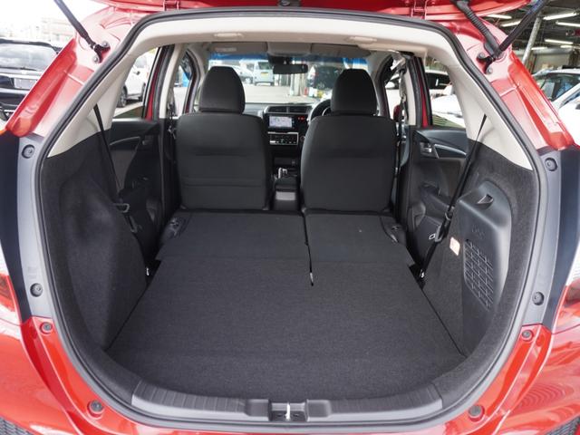 フィットハイブリッド Ｆパッケージコンフォートエディション　７インチナビ　バックカメラ　ＥＴＣ　Ｂｌｕｅｔｏｏｔｈ　ＬＥＤヘッドライト　シートヒーター　衝突被害軽減ブレーキ　横滑り防止装置　フルセグ　電動格納ドアミラー　盗難防止装置　アイドリングストップ（11枚目）