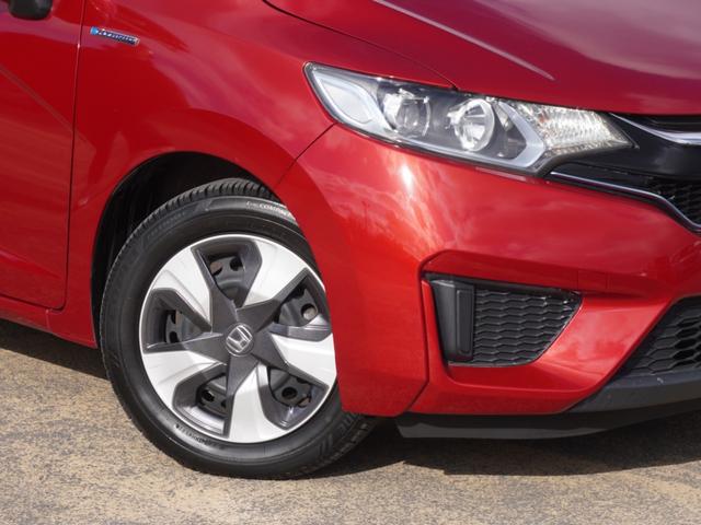 フィットハイブリッド Ｆパッケージコンフォートエディション　７インチナビ　バックカメラ　ＥＴＣ　Ｂｌｕｅｔｏｏｔｈ　ＬＥＤヘッドライト　シートヒーター　衝突被害軽減ブレーキ　横滑り防止装置　フルセグ　電動格納ドアミラー　盗難防止装置　アイドリングストップ（28枚目）