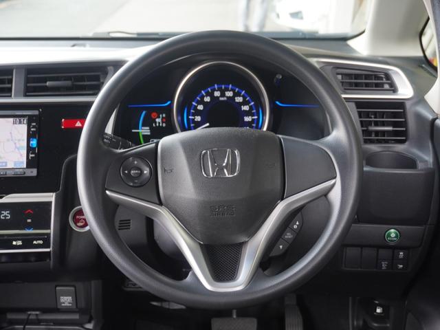 フィットハイブリッド Ｆパッケージコンフォートエディション　７インチナビ　バックカメラ　ＥＴＣ　Ｂｌｕｅｔｏｏｔｈ　ＬＥＤヘッドライト　シートヒーター　衝突被害軽減ブレーキ　横滑り防止装置　フルセグ　電動格納ドアミラー　盗難防止装置　アイドリングストップ（38枚目）