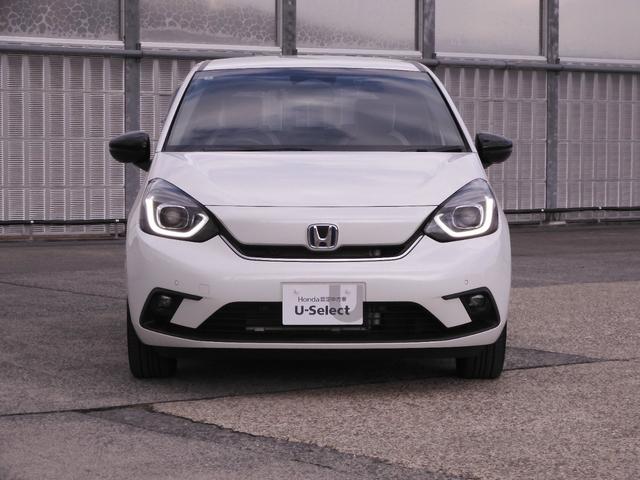 フィット e:HEVホーム20周年特別仕様車メゾン ワンオーナー 9インチ純正ナビ ドラレコ ETC2.0 バックカメラ 渋滞追従クルーズ Bluetooth 障害物センサー シートヒーター デイライト オートハイビーム フルセグTV DVD 禁煙車(2枚目)