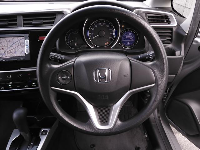 フィット １３Ｇ・Ｌパッケージ　ワンオーナー　９インチ純正ナビ　バックカメラ　ＥＴＣ　Ｂｌｕｅｔｏｏｔｈ　ＬＥＤヘッドライト　横滑り防止装置　スマートキー　盗難防止装置　ＣＤ　ＤＶＤ　ワンセグＴＶ　オートライト　ＡＢＳ　禁煙車（8枚目）