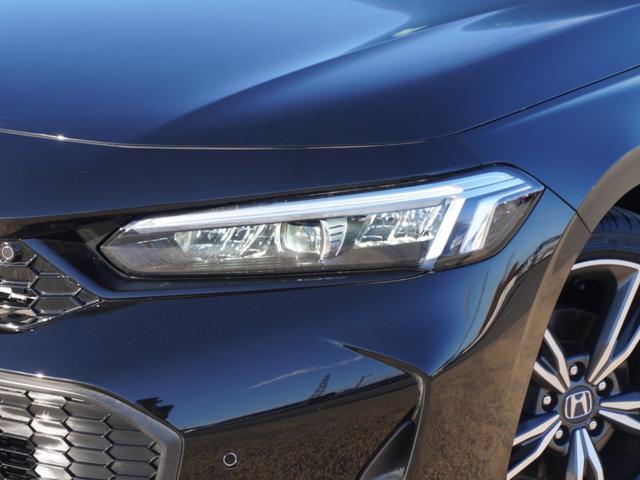 シビック ｅ：ＨＥＶＥＸ　ワンオーナー　９インチＧｏｏｇｌｅ搭載ディスプレー　ドラレコ　ＥＴＣ２．０　バックカメラ　サンルーフ　渋滞追従クルーズ　Ｂｌｕｅｔｏｏｔｈ　障害物センサー　シートヒーター　禁煙車　オートハイビーム（29枚目）