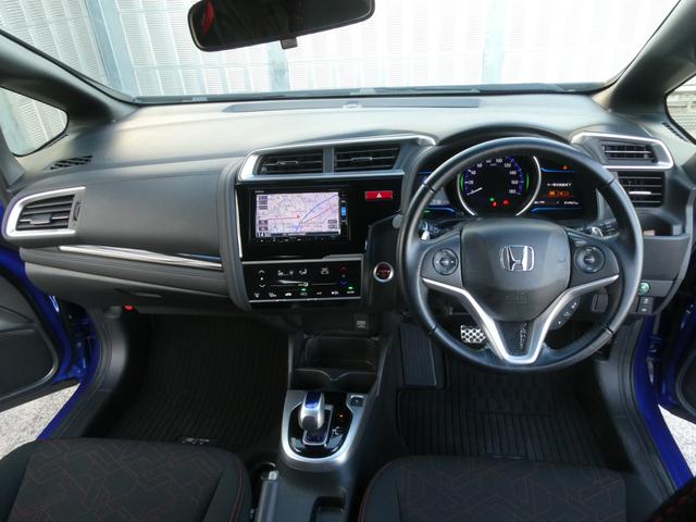 フィットハイブリッド Ｓパッケージ　ワンオーナー　７インチナビ　バックカメラ　ＥＴＣ　クルーズコントロール　Ｂｌｕｅｔｏｏｔｈ　ＬＥＤヘッドライト　衝突被害軽減ブレーキ　パドルシフト　純正アルミホイール　盗難防止装置　フルセグ　禁煙車（7枚目）