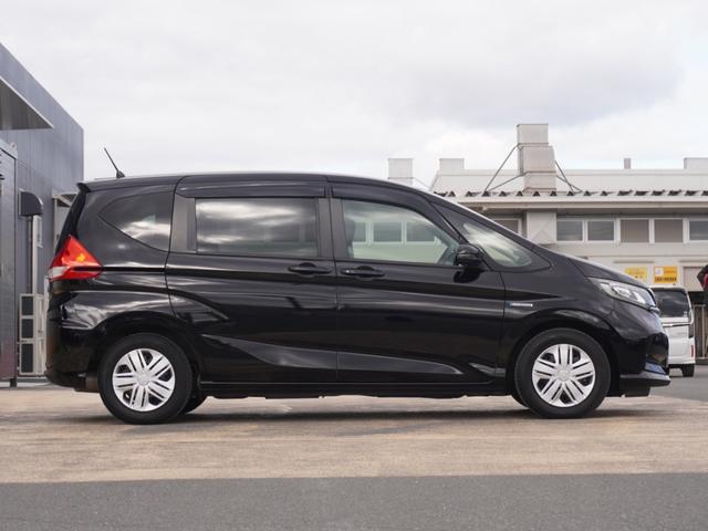 フリードハイブリッド ハイブリッド・Ｇホンダセンシング　９インチナビ　バックカメラ　ドラレコ　ＥＴＣ　アダプティブクルーズコントロール　両側電動スライドドア　シートヒーター　Ｂｌｕｅｔｏｏｔｈ　ＬＥＤヘッドライト　衝突被害軽減ブレーキ　フルセグ　禁煙車（27枚目）