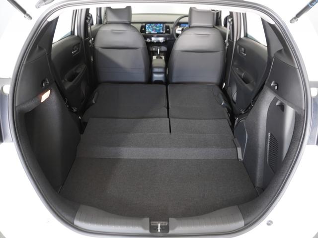 フィット ｅ：ＨＥＶホーム　２年保証当社試乗車ナビＤレコＲカメＥＴＣ地デジ　渋滞追従クルーズ　Ｂｌｕｅｔｏｏｔｈ　障害物センサー　オートハイビーム　デイライト　フルセグ　衝突軽減ブレーキ　ＤＶＤ　スペアキー有り　禁煙車（26枚目）