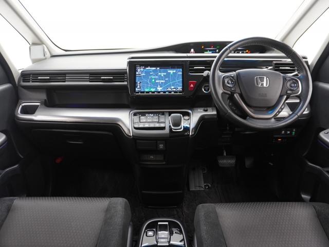 ステップワゴンスパーダ スパーダハイブリッドＧホンダセンシング　ワンオーナー　９インチインターナビ　バックカメラ　ＥＴＣ　アダプティブクルーズコントロール　両側電動スライドドア　Ｂｌｕｅｔｏｏｔｈ　ＬＥＤヘッドライト　電動格納ミラー　　衝突被害軽減ブレーキ　禁煙車（7枚目）