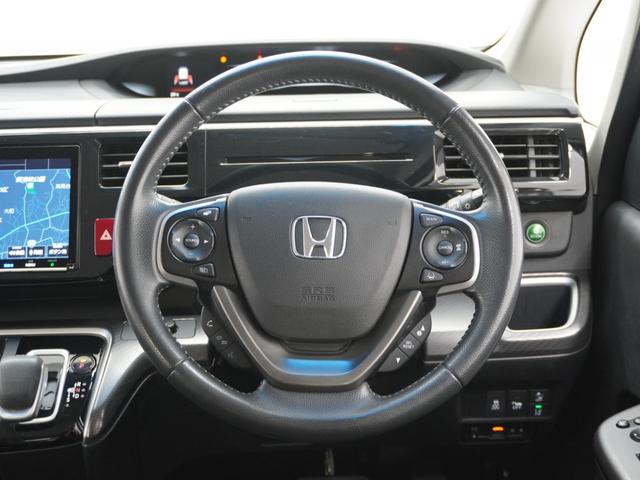 ステップワゴンスパーダ スパーダハイブリッドＧホンダセンシング　ワンオーナー　９インチインターナビ　バックカメラ　ＥＴＣ　アダプティブクルーズコントロール　両側電動スライドドア　Ｂｌｕｅｔｏｏｔｈ　ＬＥＤヘッドライト　電動格納ミラー　　衝突被害軽減ブレーキ　禁煙車（49枚目）