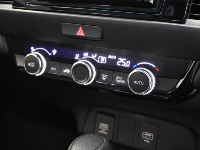 フィット ｅ：ＨＥＶネス　１年保証ナビＤレコＲカメＥＴＣクルコンＢＴ地デジ　渋滞追従クルーズ　Ｂｌｕｅｔｏｏｔｈ　障害物センサー　オートハイビーム　デイライト　フルセグ　ＤＶＤ　スペアキー　衝突軽減ブレーキ　純正アルミホイール（11枚目）