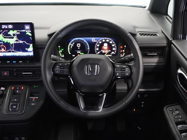 ステップワゴン ｅ：ＨＥＶスパーダ　１年保証ナビＤレコＲカメＥＴＣ両電扉ＢＴ地デジ　車内カメラ　渋滞追従クルーズ　Ｂｌｕｅｔｏｏｔｈ　障害物センサー　シートヒーター　オットマン　ブラインドスポット　純正アルミホイール　フルセグＴＶ（10枚目）