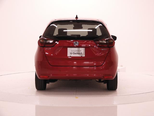 フィット ｅ：ＨＥＶホーム２０周年特別仕様車カーサ　９インチナビ　バックカメラ　ＥＴＣ　アダプティブクルーズコントロール　シートヒーター　Ｂｌｕｅｔｏｏｔｈ　ＵＳＢ入力端子　ＬＥＤヘッドライト　衝突被害軽減ブレーキ　障害物センサー　純正アルミホイール（12枚目）