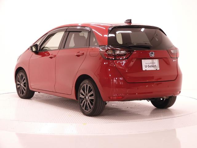 フィット ｅ：ＨＥＶホーム２０周年特別仕様車カーサ　９インチナビ　バックカメラ　ＥＴＣ　アダプティブクルーズコントロール　シートヒーター　Ｂｌｕｅｔｏｏｔｈ　ＵＳＢ入力端子　ＬＥＤヘッドライト　衝突被害軽減ブレーキ　障害物センサー　純正アルミホイール（27枚目）