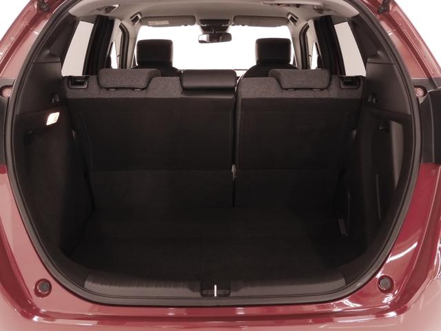 フィット ｅ：ＨＥＶホーム２０周年特別仕様車カーサ　９インチナビ　バックカメラ　ＥＴＣ　アダプティブクルーズコントロール　シートヒーター　Ｂｌｕｅｔｏｏｔｈ　ＵＳＢ入力端子　ＬＥＤヘッドライト　衝突被害軽減ブレーキ　障害物センサー　純正アルミホイール（34枚目）