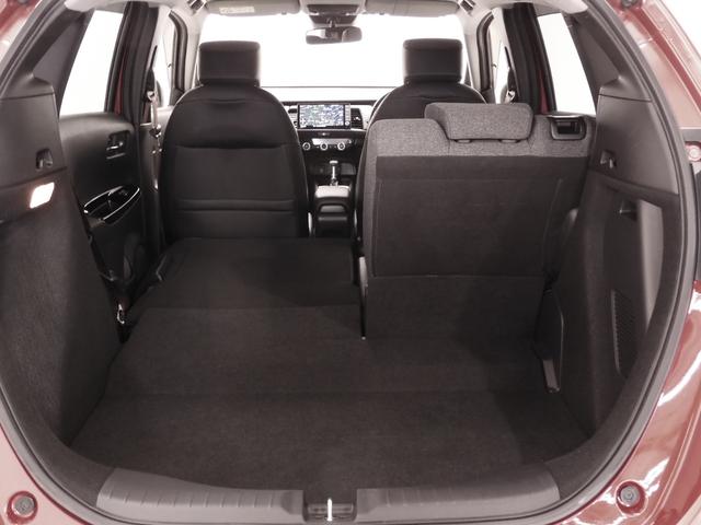 フィット ｅ：ＨＥＶホーム２０周年特別仕様車カーサ　９インチナビ　バックカメラ　ＥＴＣ　アダプティブクルーズコントロール　シートヒーター　Ｂｌｕｅｔｏｏｔｈ　ＵＳＢ入力端子　ＬＥＤヘッドライト　衝突被害軽減ブレーキ　障害物センサー　純正アルミホイール（35枚目）