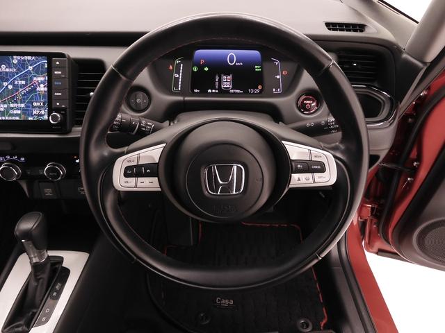 フィット ｅ：ＨＥＶホーム２０周年特別仕様車カーサ　９インチナビ　バックカメラ　ＥＴＣ　アダプティブクルーズコントロール　シートヒーター　Ｂｌｕｅｔｏｏｔｈ　ＵＳＢ入力端子　ＬＥＤヘッドライト　衝突被害軽減ブレーキ　障害物センサー　純正アルミホイール（46枚目）