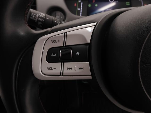 フィット ｅ：ＨＥＶホーム２０周年特別仕様車カーサ　９インチナビ　バックカメラ　ＥＴＣ　アダプティブクルーズコントロール　シートヒーター　Ｂｌｕｅｔｏｏｔｈ　ＵＳＢ入力端子　ＬＥＤヘッドライト　衝突被害軽減ブレーキ　障害物センサー　純正アルミホイール（47枚目）