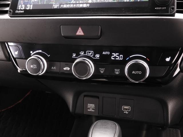 フィット ｅ：ＨＥＶホーム２０周年特別仕様車カーサ　９インチナビ　バックカメラ　ＥＴＣ　アダプティブクルーズコントロール　シートヒーター　Ｂｌｕｅｔｏｏｔｈ　ＵＳＢ入力端子　ＬＥＤヘッドライト　衝突被害軽減ブレーキ　障害物センサー　純正アルミホイール（51枚目）