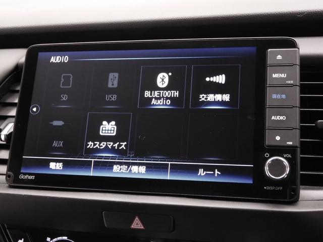 フィット ｅ：ＨＥＶホーム２０周年特別仕様車カーサ　９インチナビ　バックカメラ　ＥＴＣ　アダプティブクルーズコントロール　シートヒーター　Ｂｌｕｅｔｏｏｔｈ　ＵＳＢ入力端子　ＬＥＤヘッドライト　衝突被害軽減ブレーキ　障害物センサー　純正アルミホイール（53枚目）