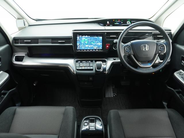 ステップワゴンスパーダ ｅ：ＨＥＶスパーダＧホンダセンシング　ワンオーナー　９インチナビ　フリップダウンモニター　バックカメラ　ドラレコ　ＥＴＣ２．０　アダプティブクルーズコントロール　両側電動スライドドア　ＬＥＤヘッドライト　純正アルミホイール　禁煙車（9枚目）